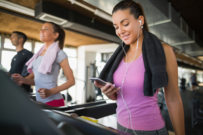 Woman working out with phone